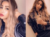 جمبسوت أسود من الجلد مع ستايل شعر مموج