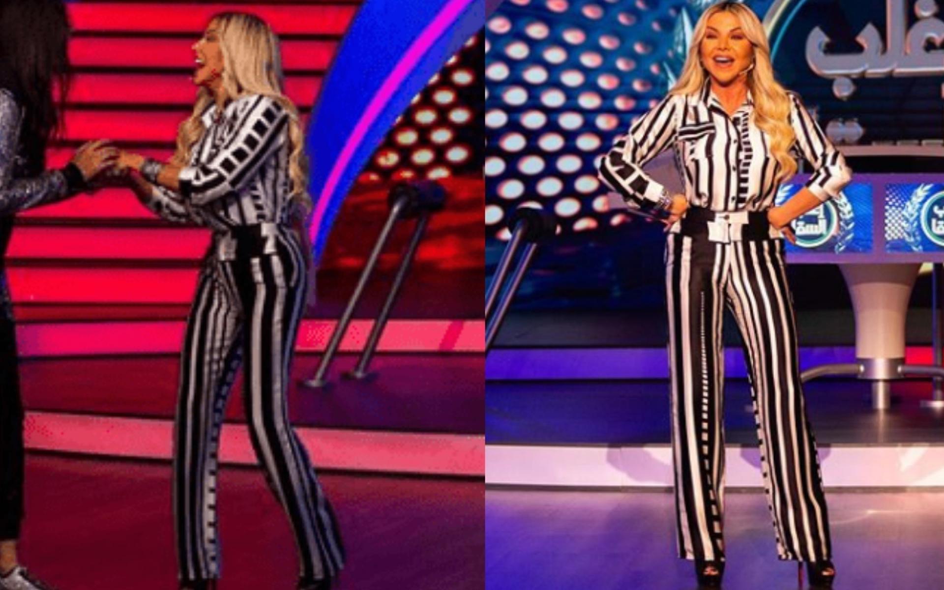 إطلالة مخططة باللونين الأبيض والأسود أبرزت قوامها بشكل أكبر