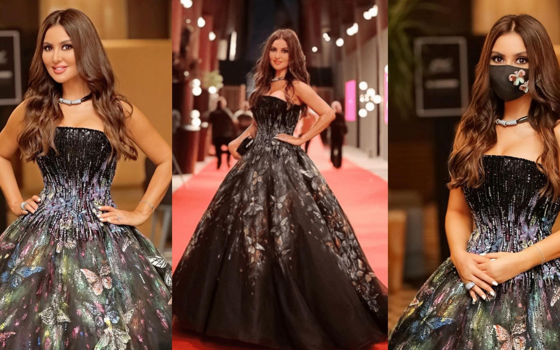 تألقت ميساء مغربي بفستان أسود منفوش مزين بالفراشات وكمامة من نفس قماشة الفستان تألقت ميساء مغربي بفستان أسود منفوش مزين بالفراشات وكمامة من نفس قماشة الفستان