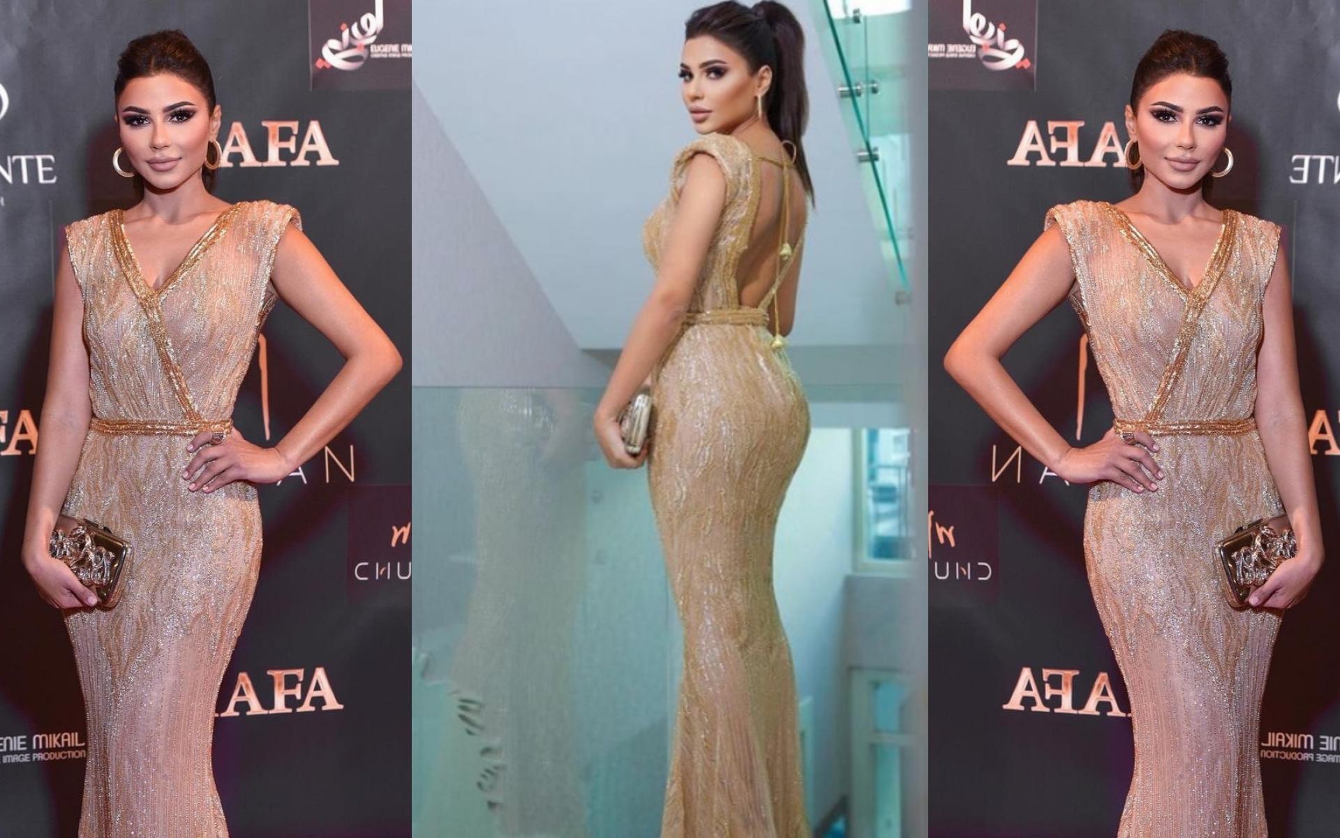 اختارت مهيرة عبد العزيز فستان ذهبي طويل خلال تقديم إحدى فقرات البرنامج اختارت مهيرة عبد العزيز فستان ذهبي طويل خلال تقديم إحدى فقرات البرنامج